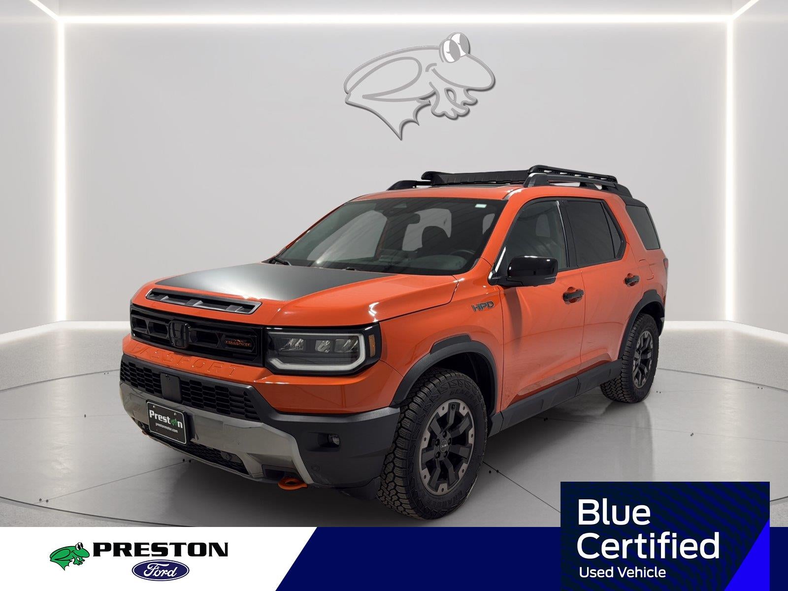 2026 Honda Passport TrailSport Elite in Sunset Orange II — front three-quarter view