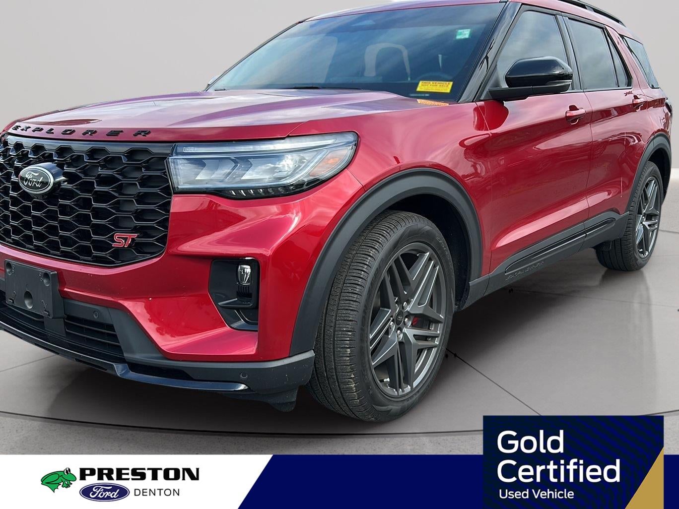 2025 Ford Explorer ST in Rapid Red Metallic Tinted Clearcoat — front three-quarter view